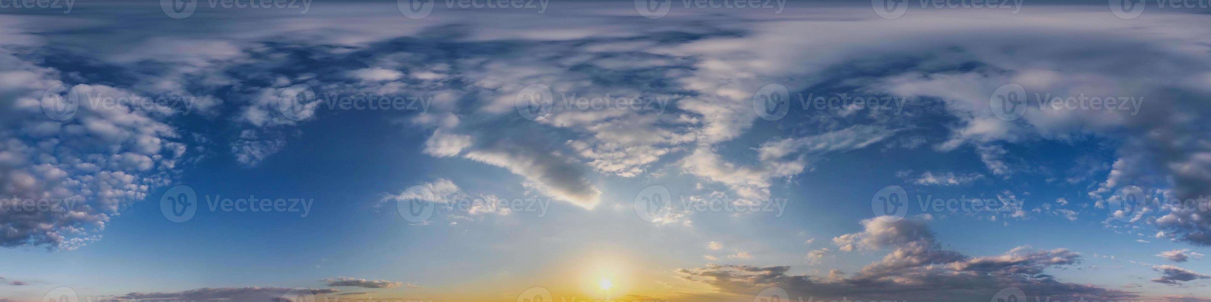 Seamless blue sky before sunset hdri panorama 360 degrees angle view with beautiful clouds for use in 3d graphics or game development as sky dome or edit drone shot photo
