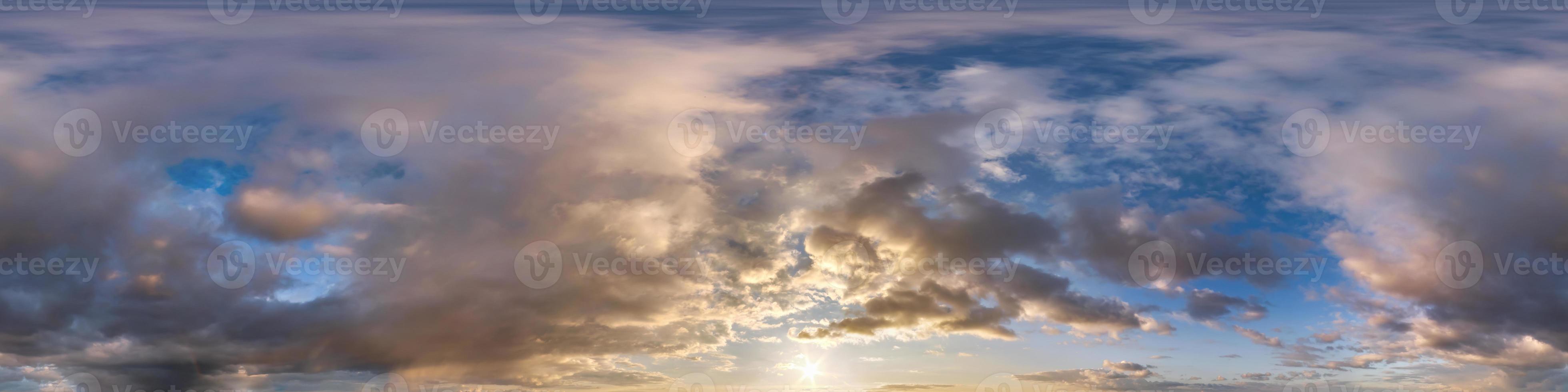 Seamless evening  blue sky hdri panorama 360 degrees angle view with zenith and beautiful clouds for use in 3d graphics as sky dome or edit drone shot photo