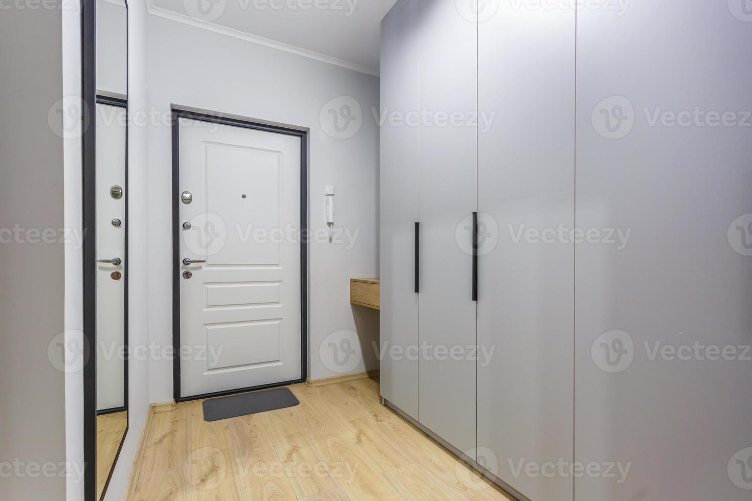 door in modern entrance hall of corridor in apartments photo