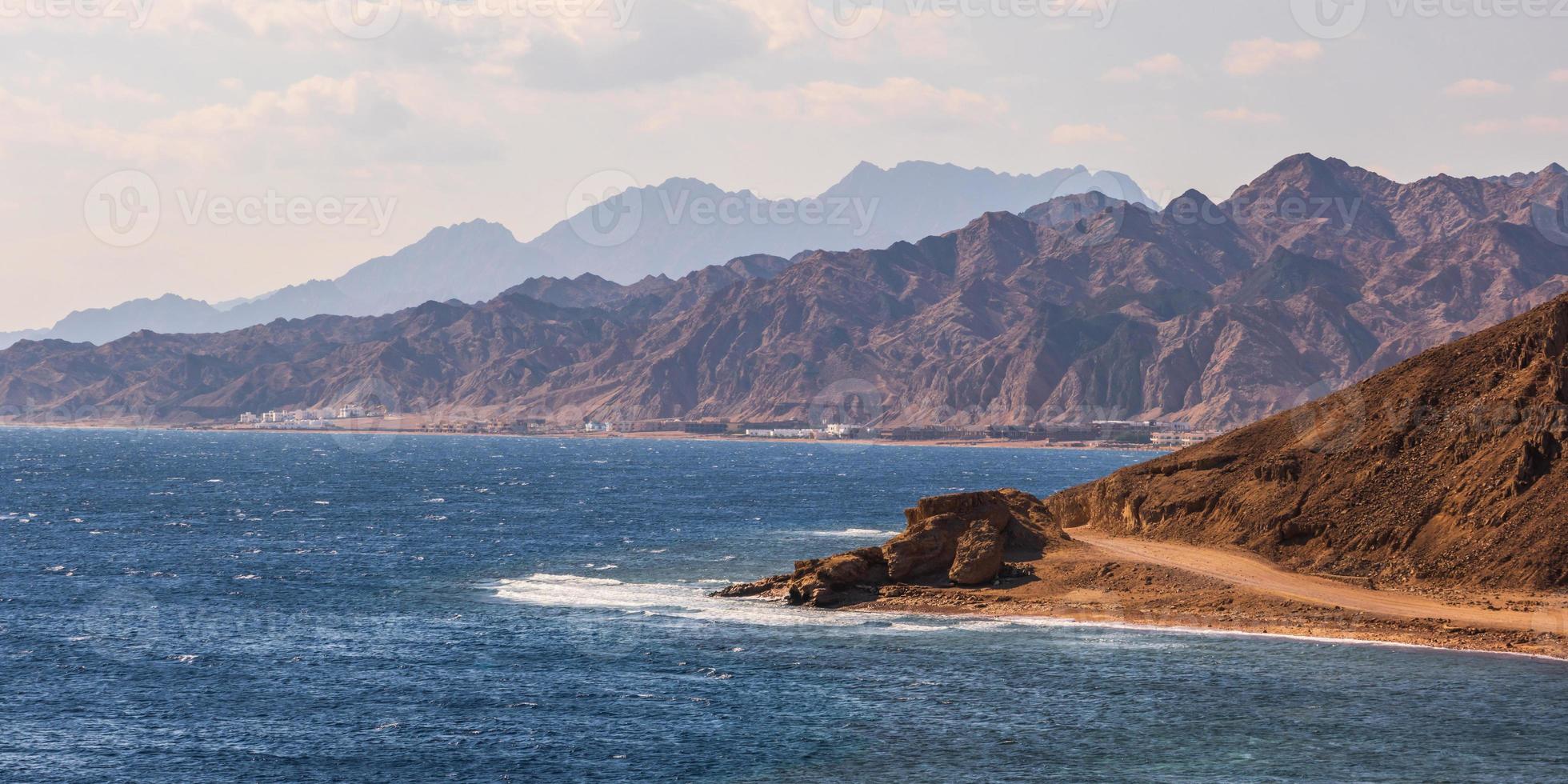 panorama view from the height of the mountains range  to the blue sea photo