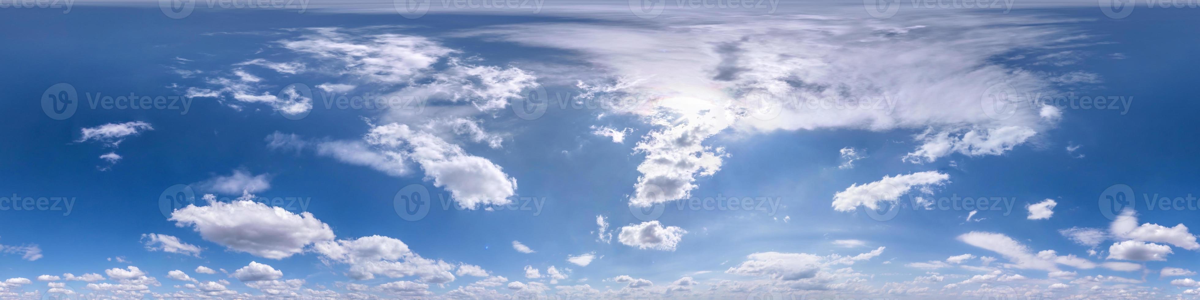 Seamless blue sky hdri panorama 360 degrees angle view with beautiful clouds with zenith for use in 3d graphics as sky dome or edit drone shot photo