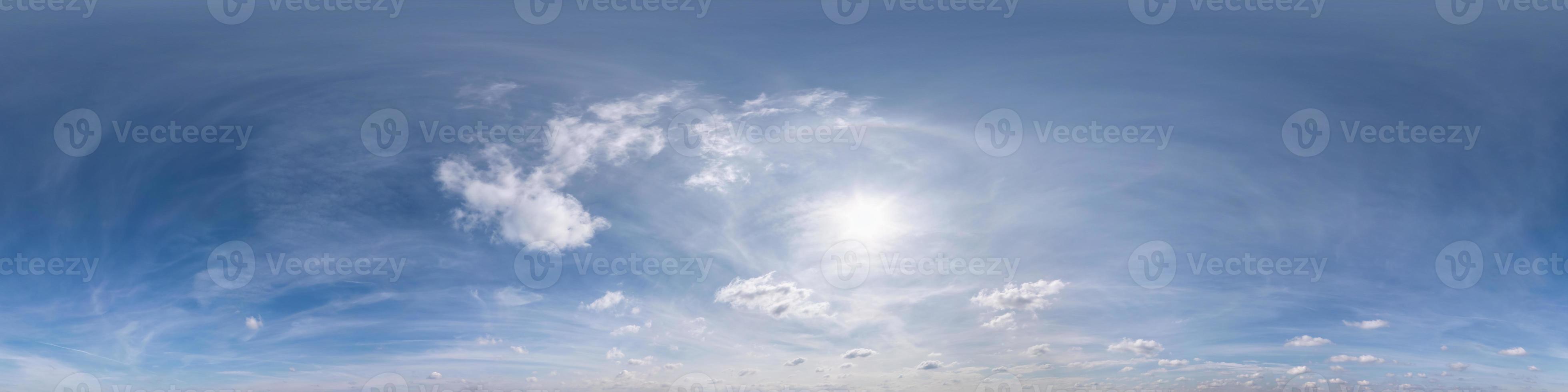 Seamless cloudy blue sky hdri panorama 360 degrees angle view with beautiful clouds  with zenith for use in 3d graphics or game as sky dome or edit drone shot photo