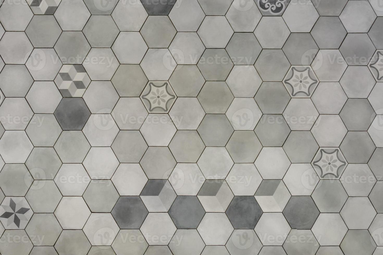 stone and ceramic floor tiles texture, view from above photo