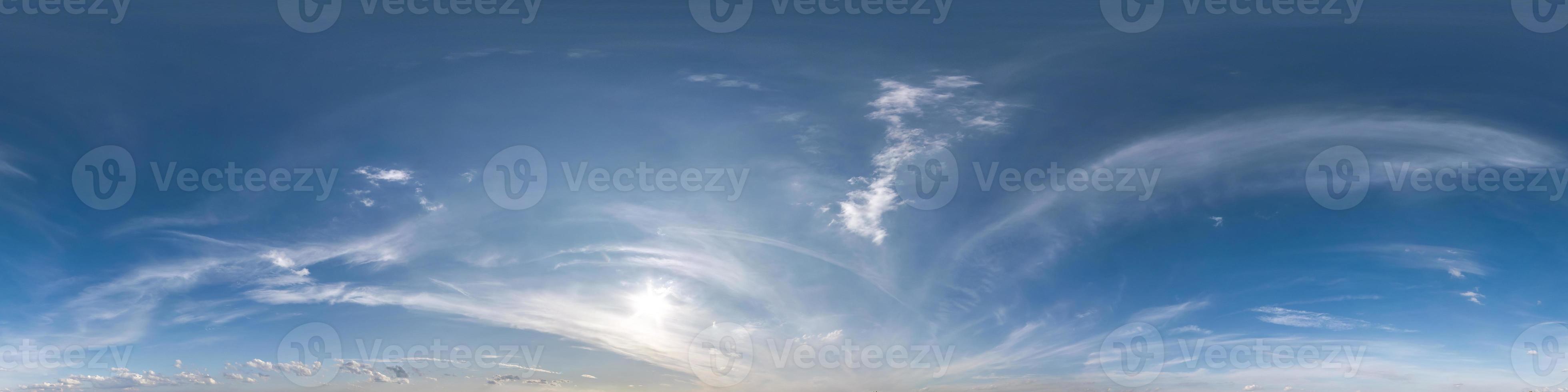 blue sky hdr 360 panorama with white beautiful clouds in seamless projection with zenith for use in 3d graphics or game development as sky dome or edit drone shot for sky replacement photo