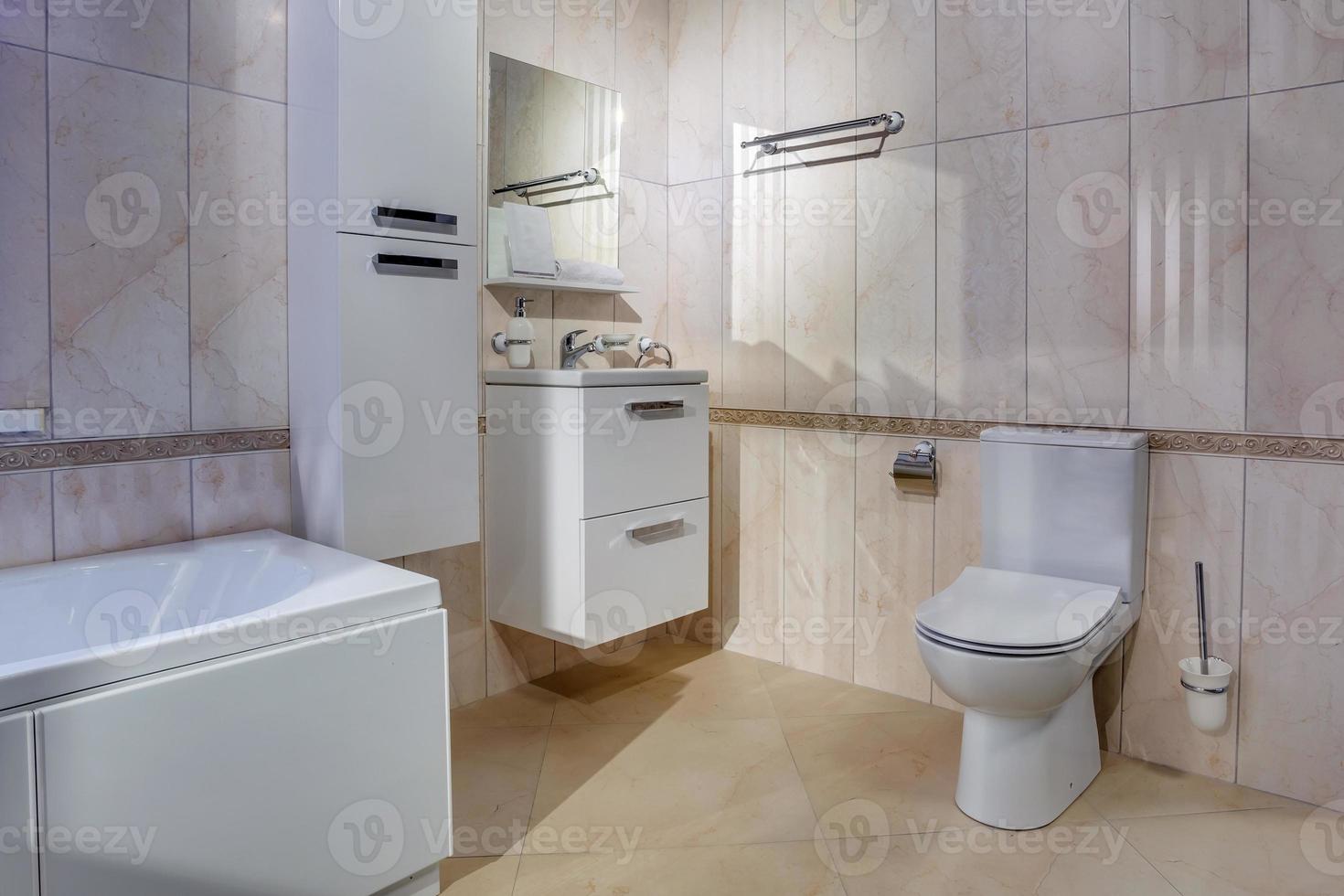 white ceramic toilet bowl in restroom photo