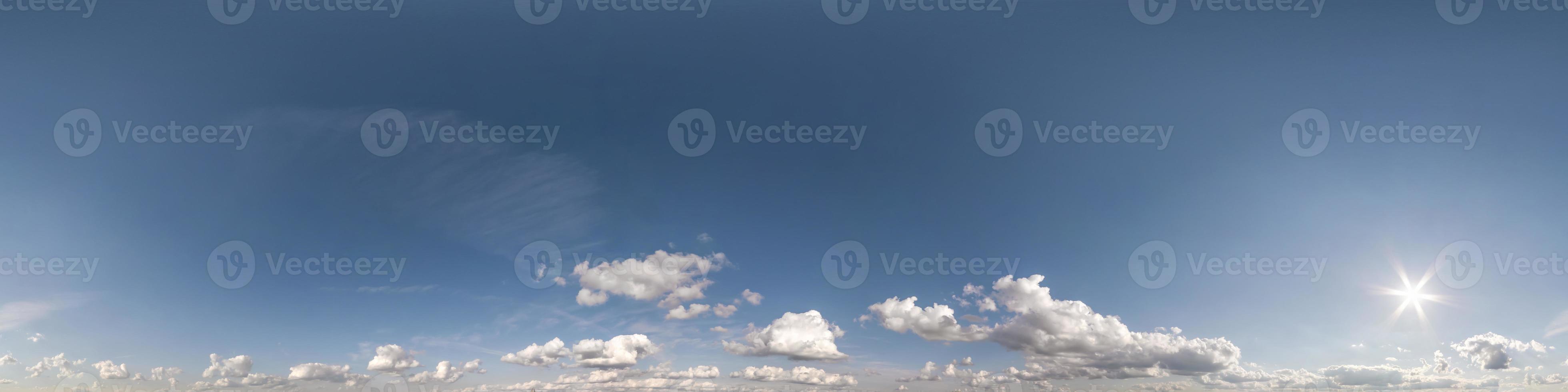 blue sky hdr 360 panorama with white beautiful clouds in seamless projection with zenith for use in 3d graphics or game development as sky dome or edit drone shot for sky replacement photo