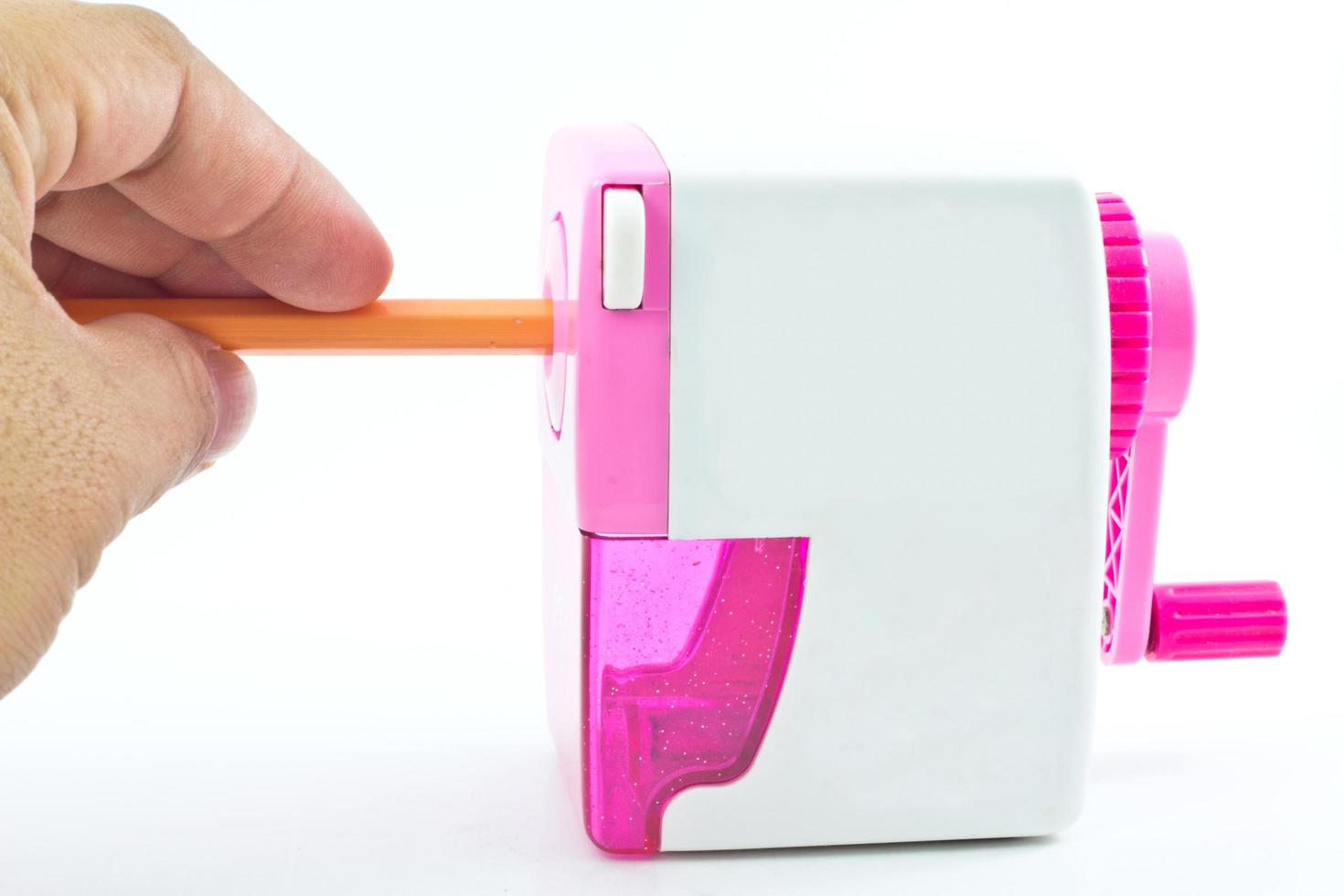 Mechanical sharpener of pencil on the white background photo