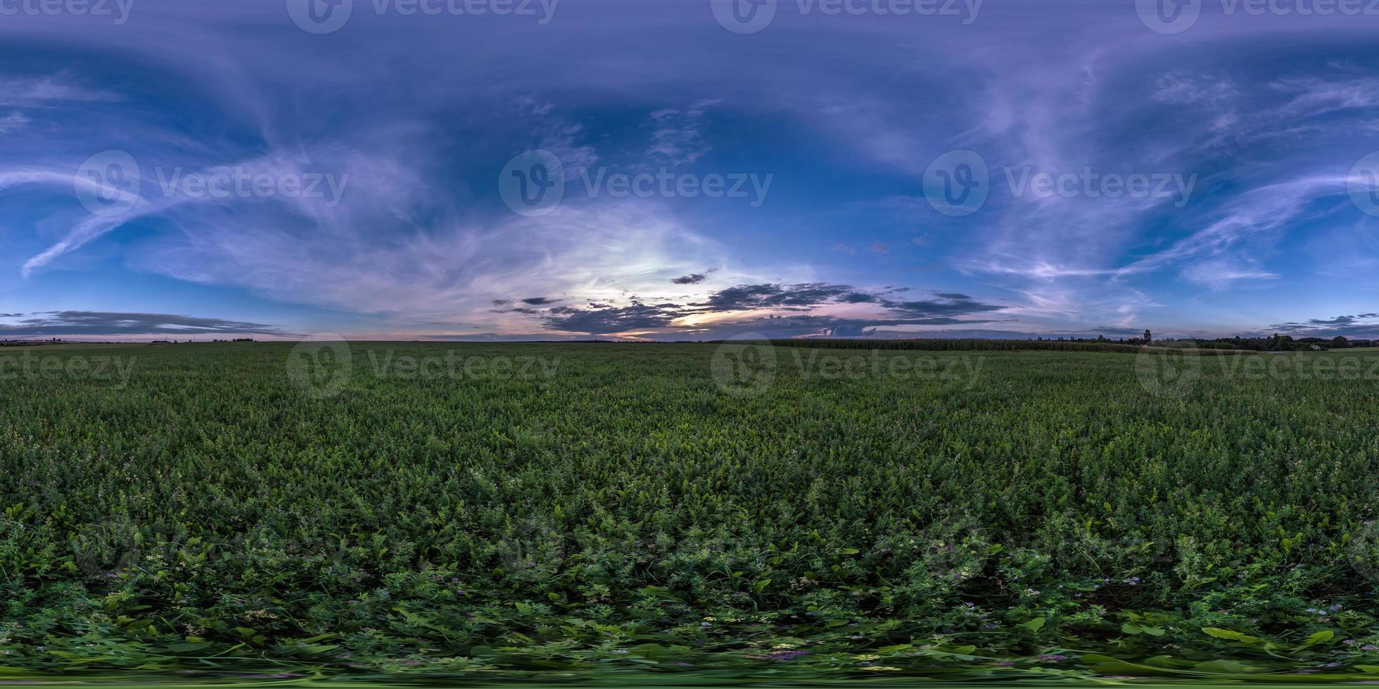 full seamless spherical hdri panorama 360 degrees angle view among fields in summer evening sunset with awesome blue pink red clouds in equirectangular projection, ready for VR AR virtual reality photo