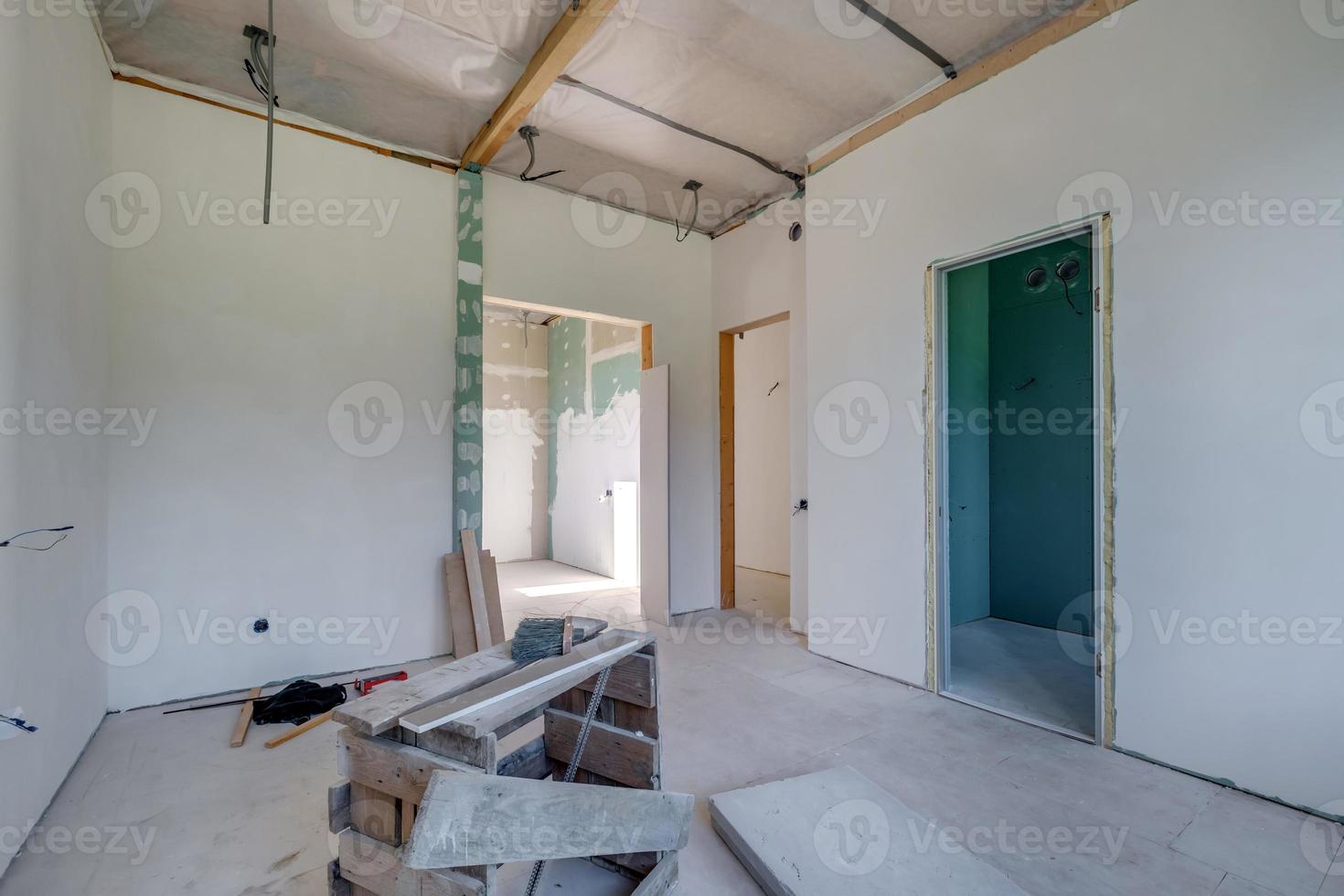 empty white green drywall room with repair and without furniture photo