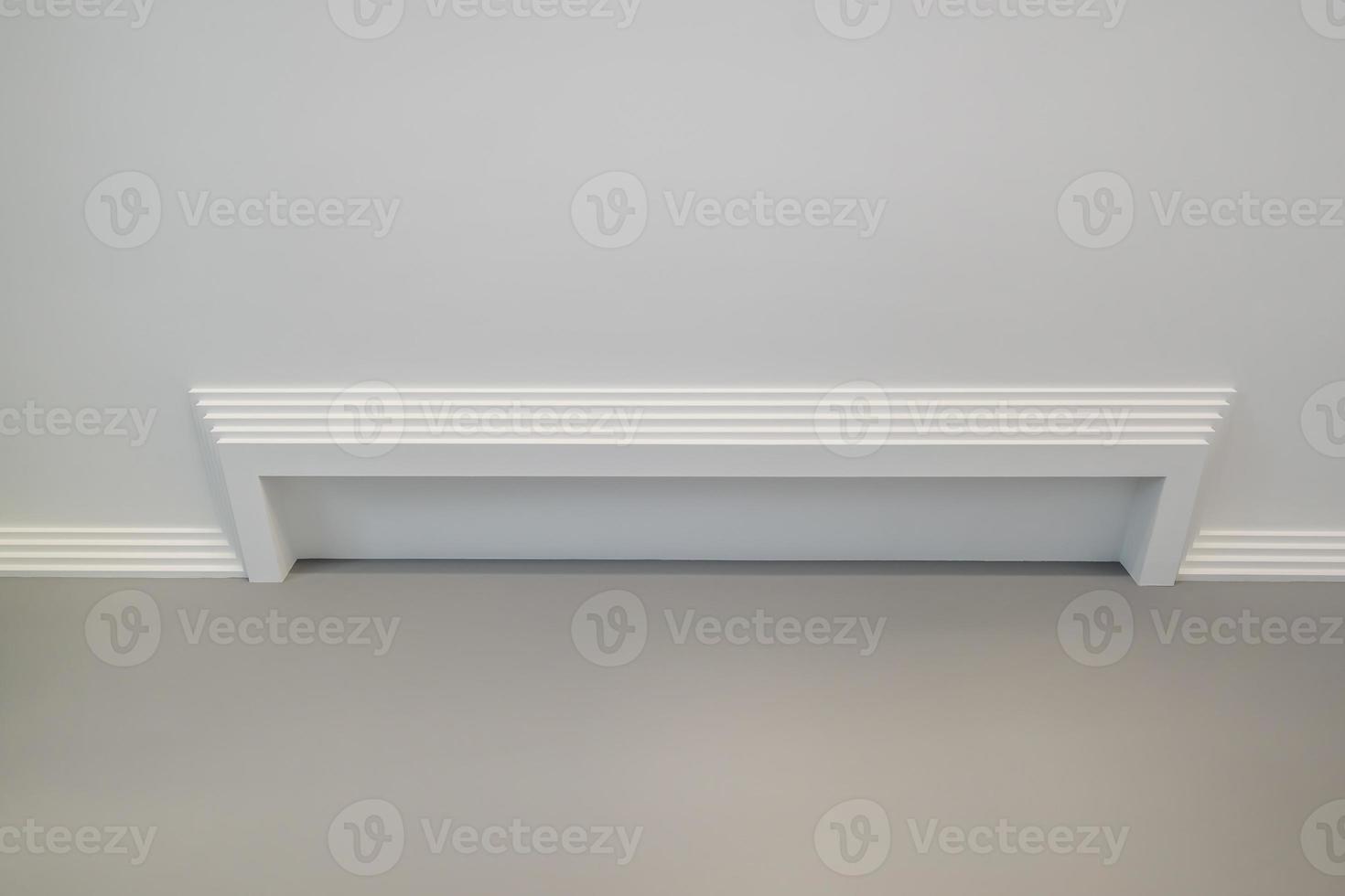 Detail of corner ceiling with intricate crown molding. photo