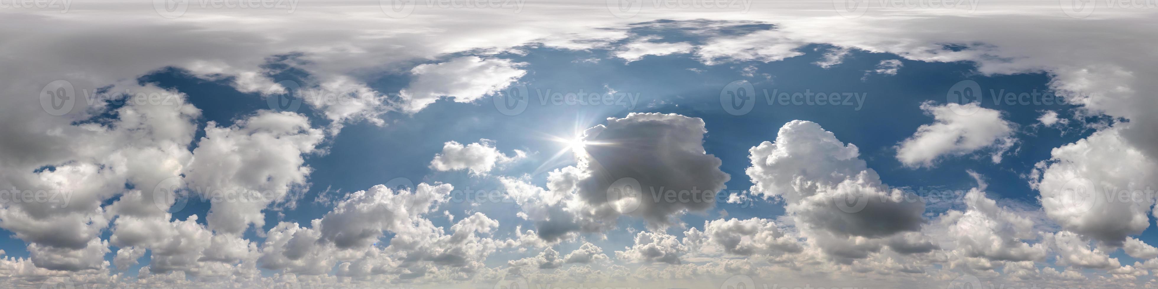 Seamless cloudy blue sky hdri panorama 360 degrees angle view with beautiful clouds  with zenith for use in 3d graphics or game as sky dome or edit drone shot photo