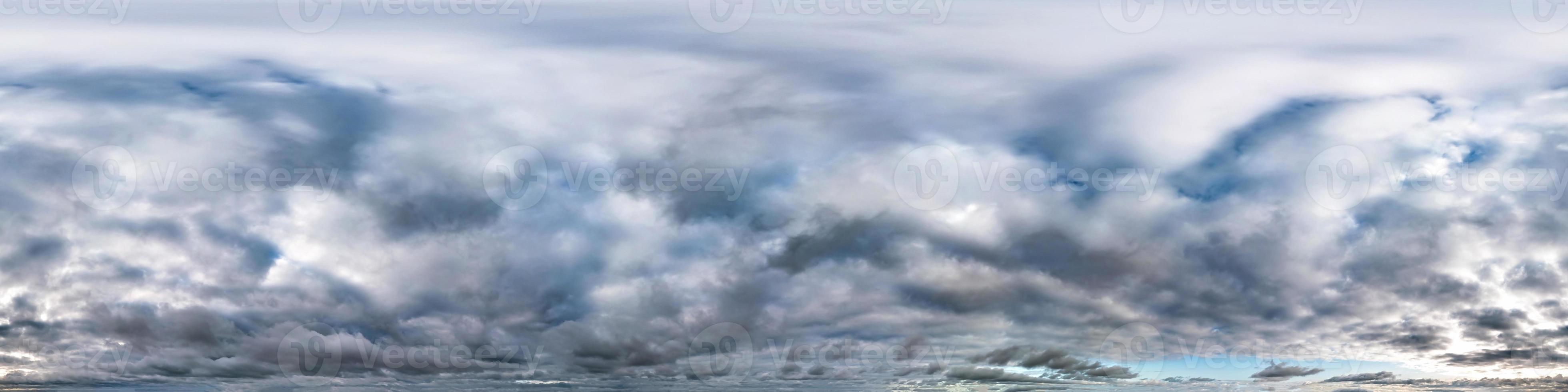 blue sky with beautiful evening cumulus clouds. Seamless hdri panorama 360 degrees angle view with zenith for use in graphics or game development as sky dome or edit drone shot photo