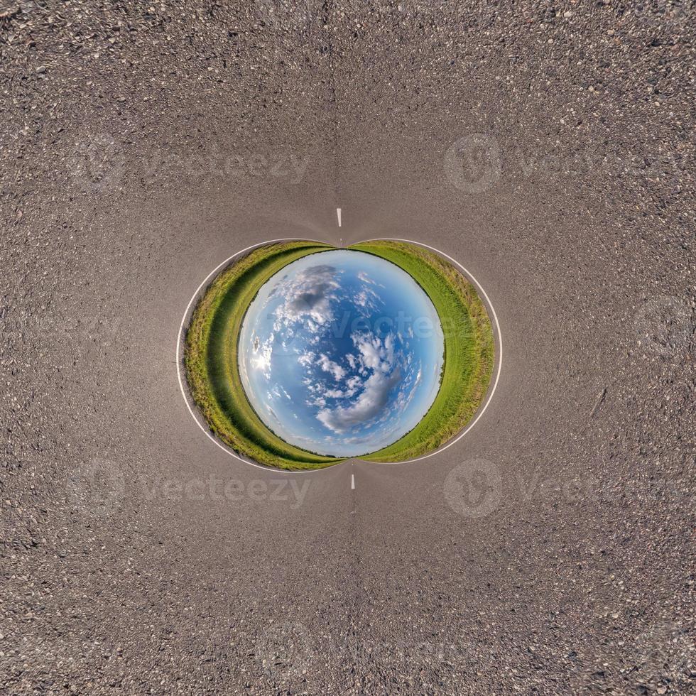 Blue little planet ball. Inversion of tiny planet transformation of spherical panorama 360 degrees. Spherical abstract aerial view. Curvature of space. photo