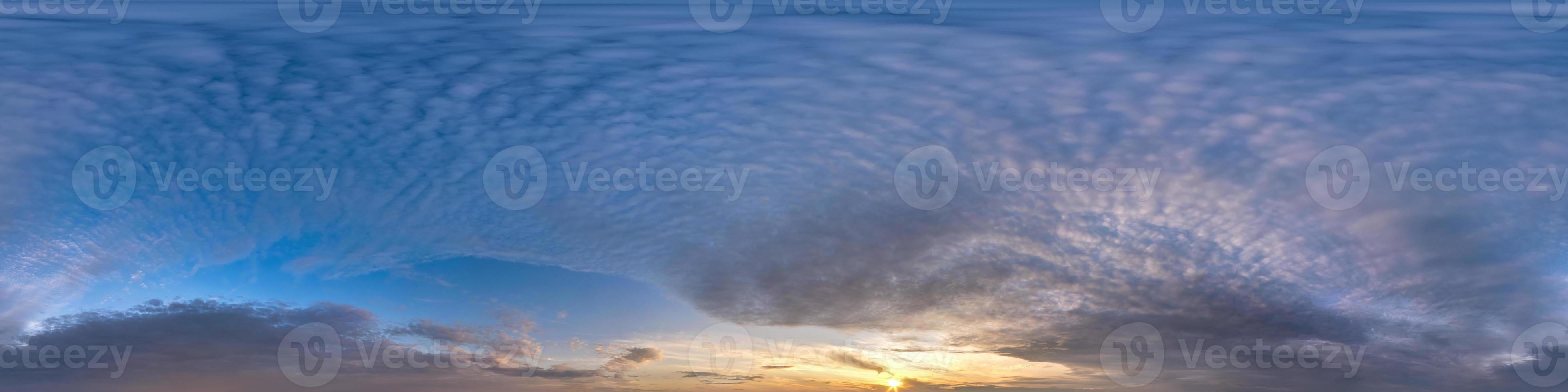 evening blue sky hdr 360 panorama with white beautiful clouds in seamless projection with zenith for use in 3d graphics or game development as sky dome or edit drone shot for sky replacement photo