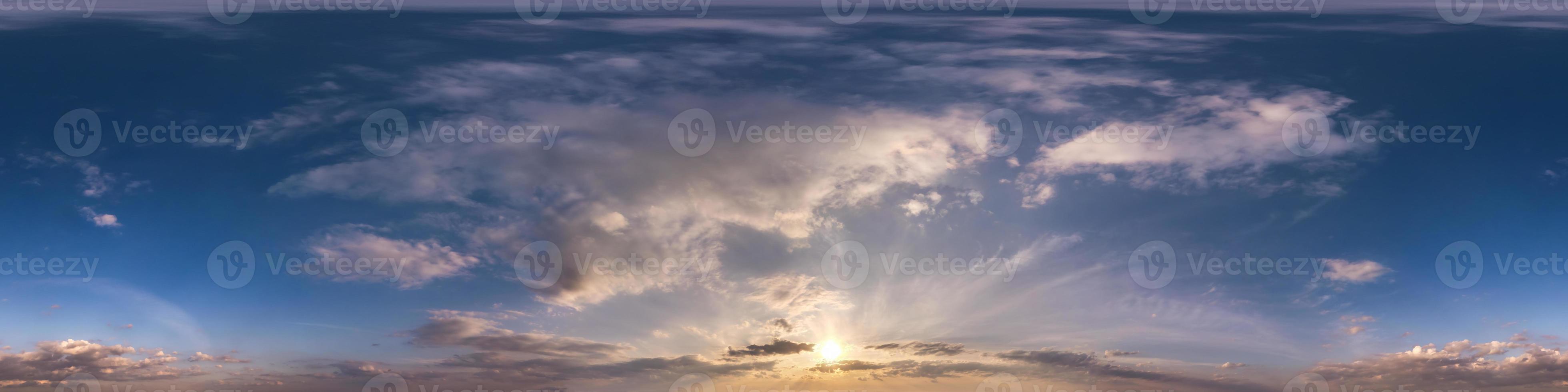 Seamless evening  blue sky hdri panorama 360 degrees angle view with zenith and beautiful clouds for use in 3d graphics as sky dome or edit drone shot photo