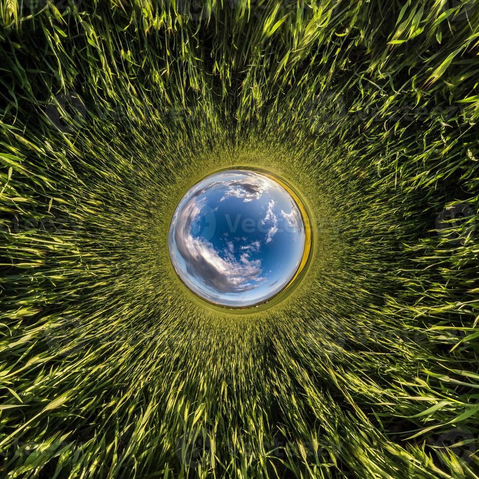 Blue little planet. Inversion of tiny planet transformation of spherical panorama 360 degrees. Spherical abstract aerial view. Curvature of space. photo