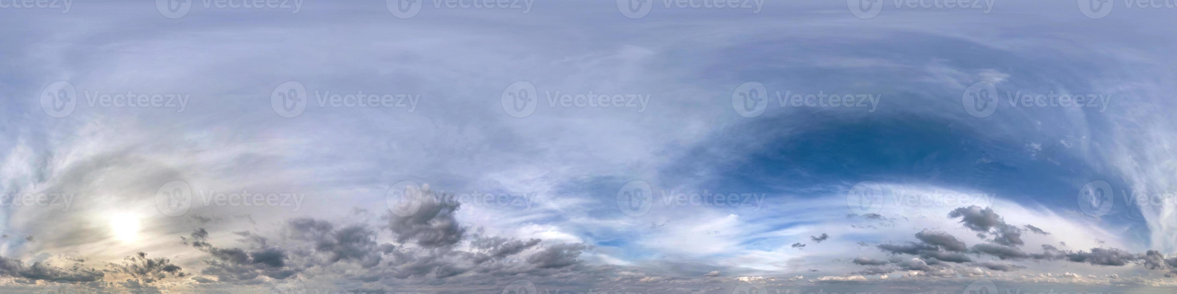 Seamless hdri panorama 360 degrees angle view blue sky with beautiful fluffy cumulus clouds with zenith for use in 3d graphics or game development as sky dome or edit drone shot photo