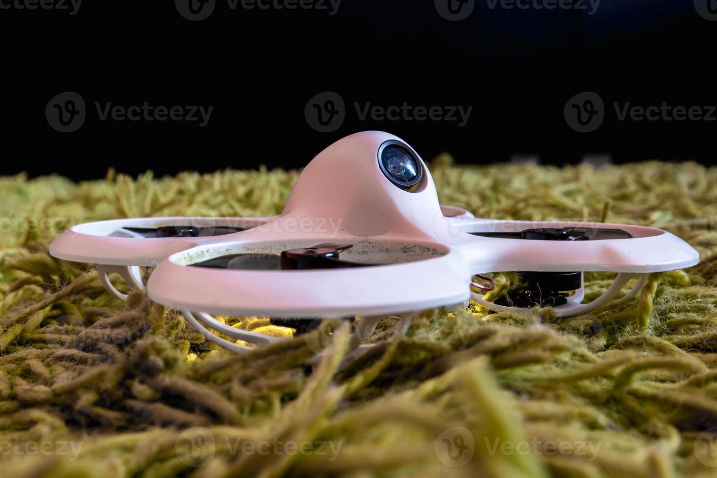 small white indoor home brushless fpv quadcopter photo