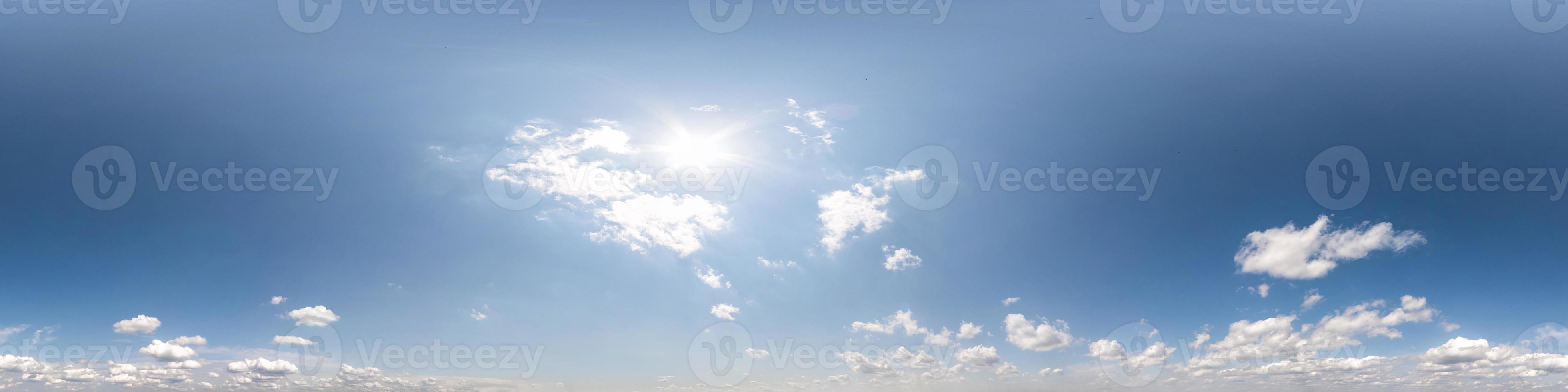 clear blue sky with beautiful clouds. Seamless hdri panorama 360 degrees angle view without ground for use in 3d graphics or game development as sky dome or edit drone shot photo