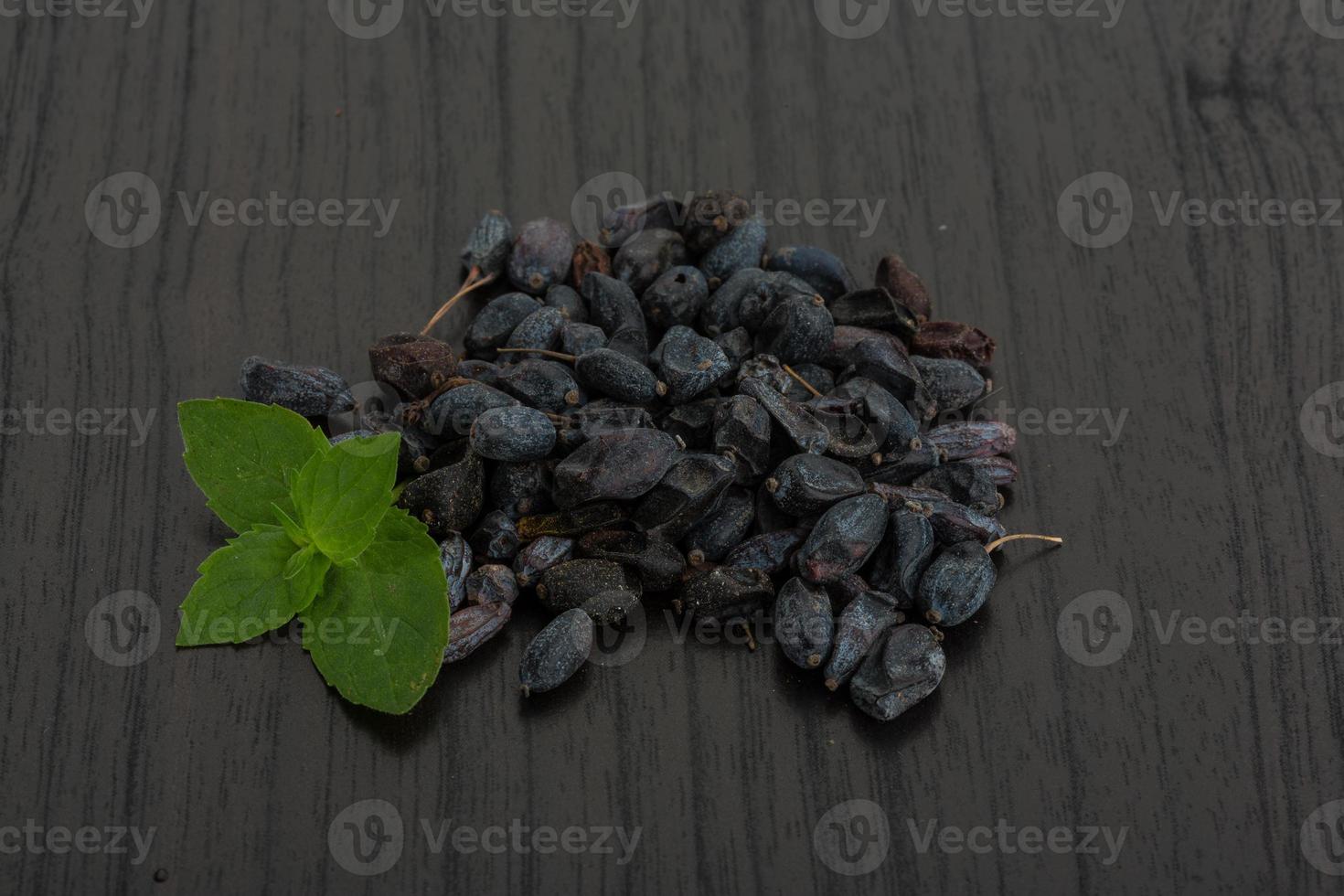 Berberis on wooden background photo