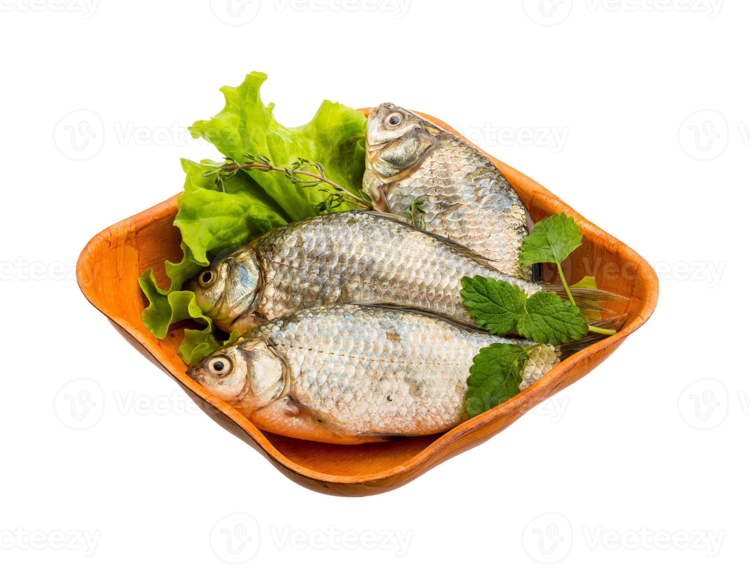 Crucian fish in a bowl on white background 10935066 Stock Photo at Vecteezy