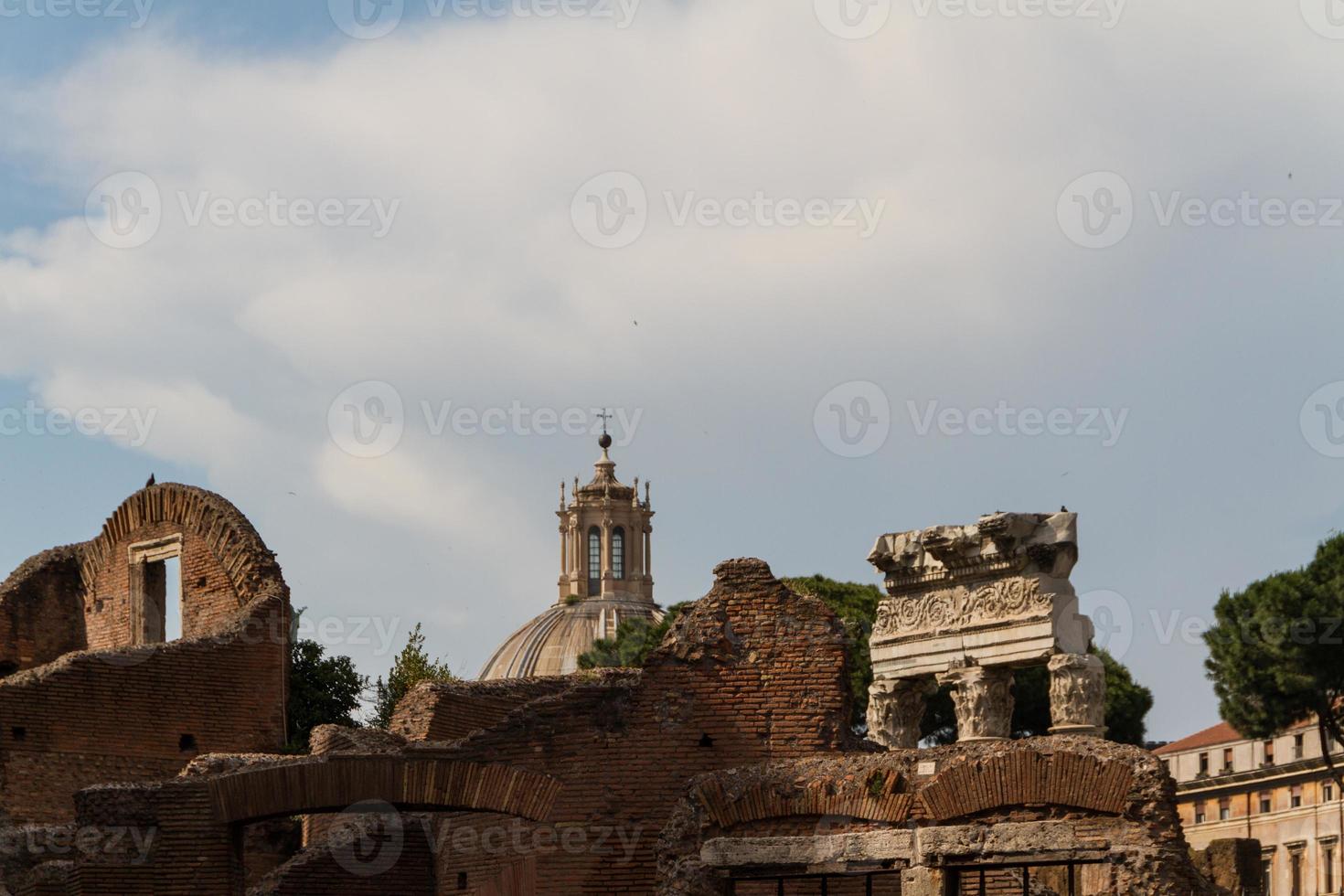 Building ruins and ancient columns  in Rome, Italy photo