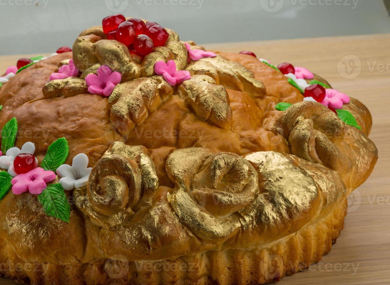 Karavay - Russian traditional bread on wooden background photo