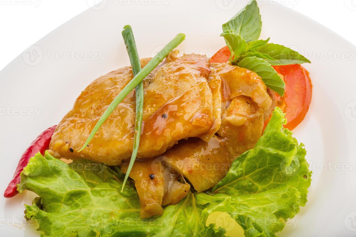 Baracuda steak on the plate and white background photo