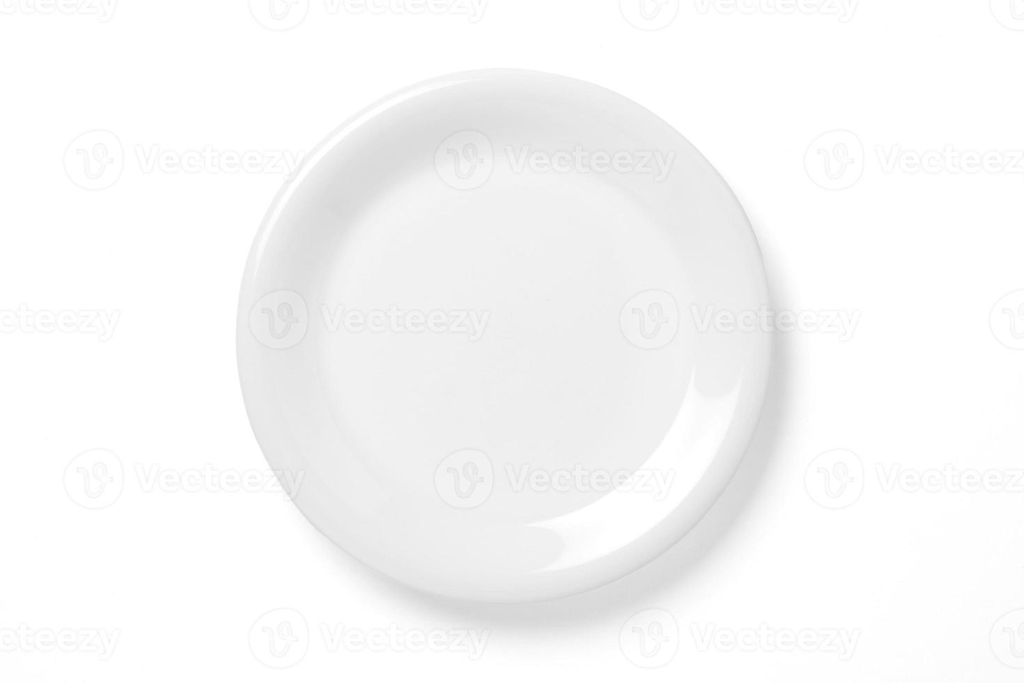 Empty plate isolated on white photo