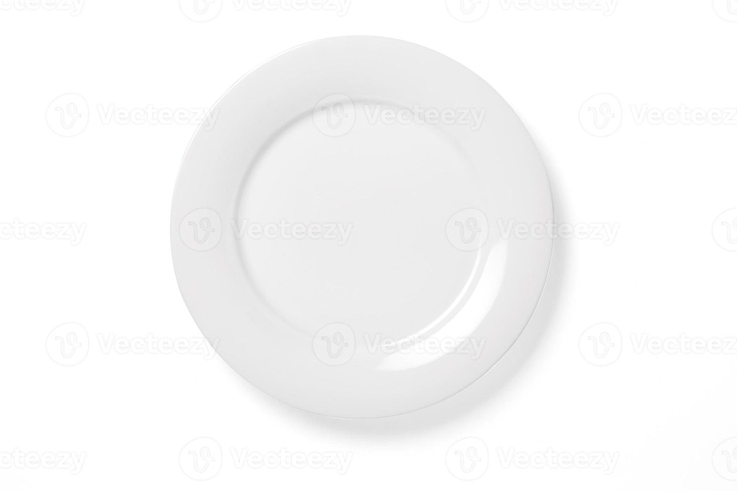 Empty plate isolated on white photo