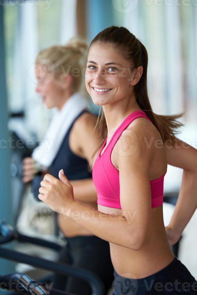 woman exercising on treadmill in gym photo