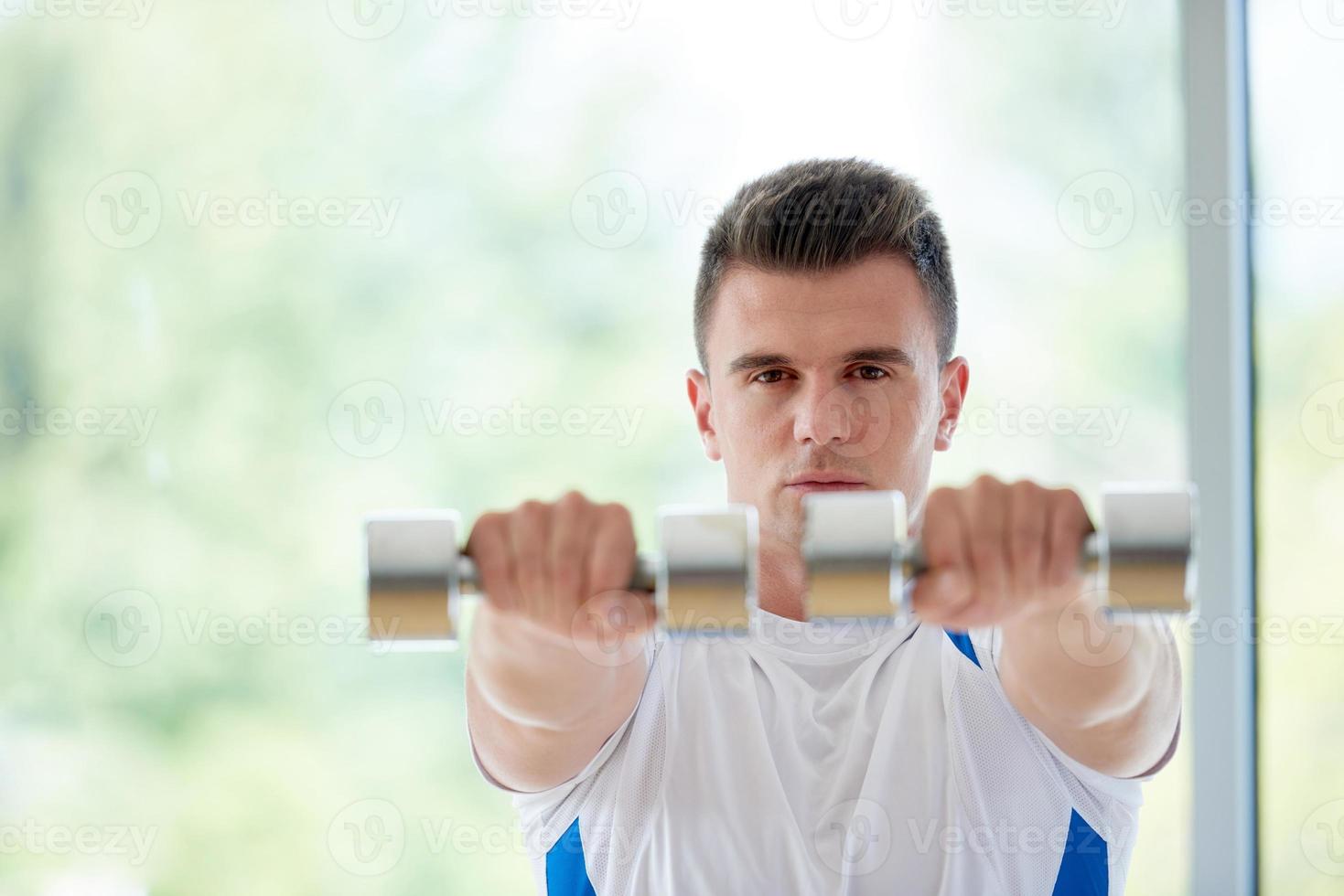 man exercise with weights photo