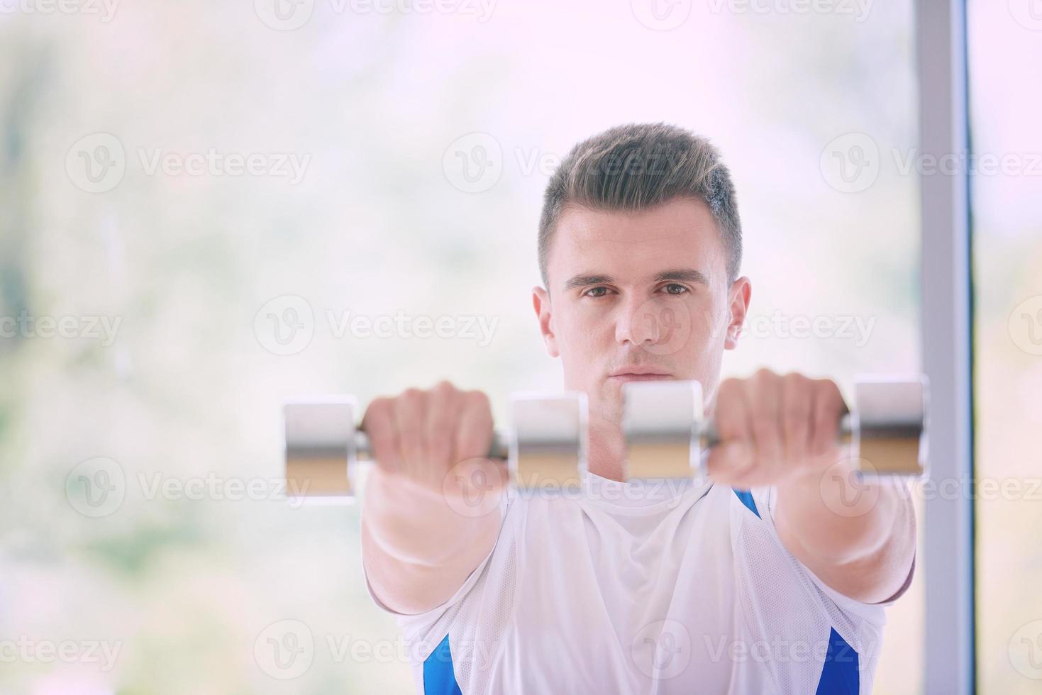 man exercise with weights photo