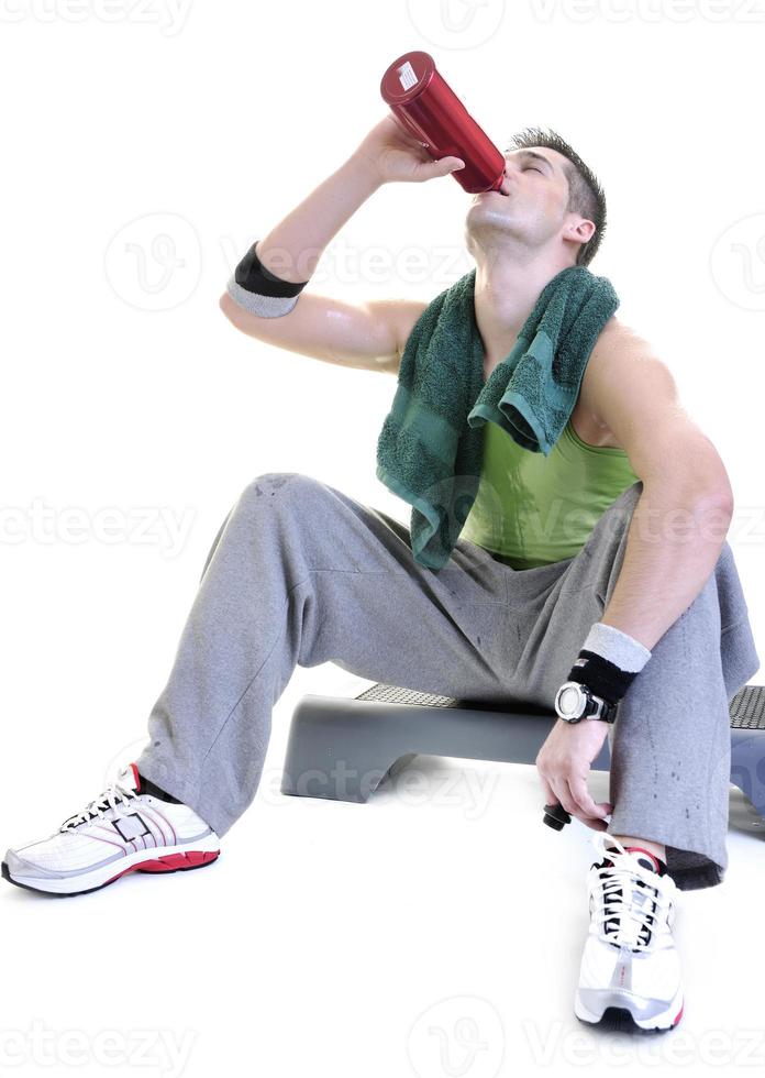 sportsman relaxing and drinking water photo