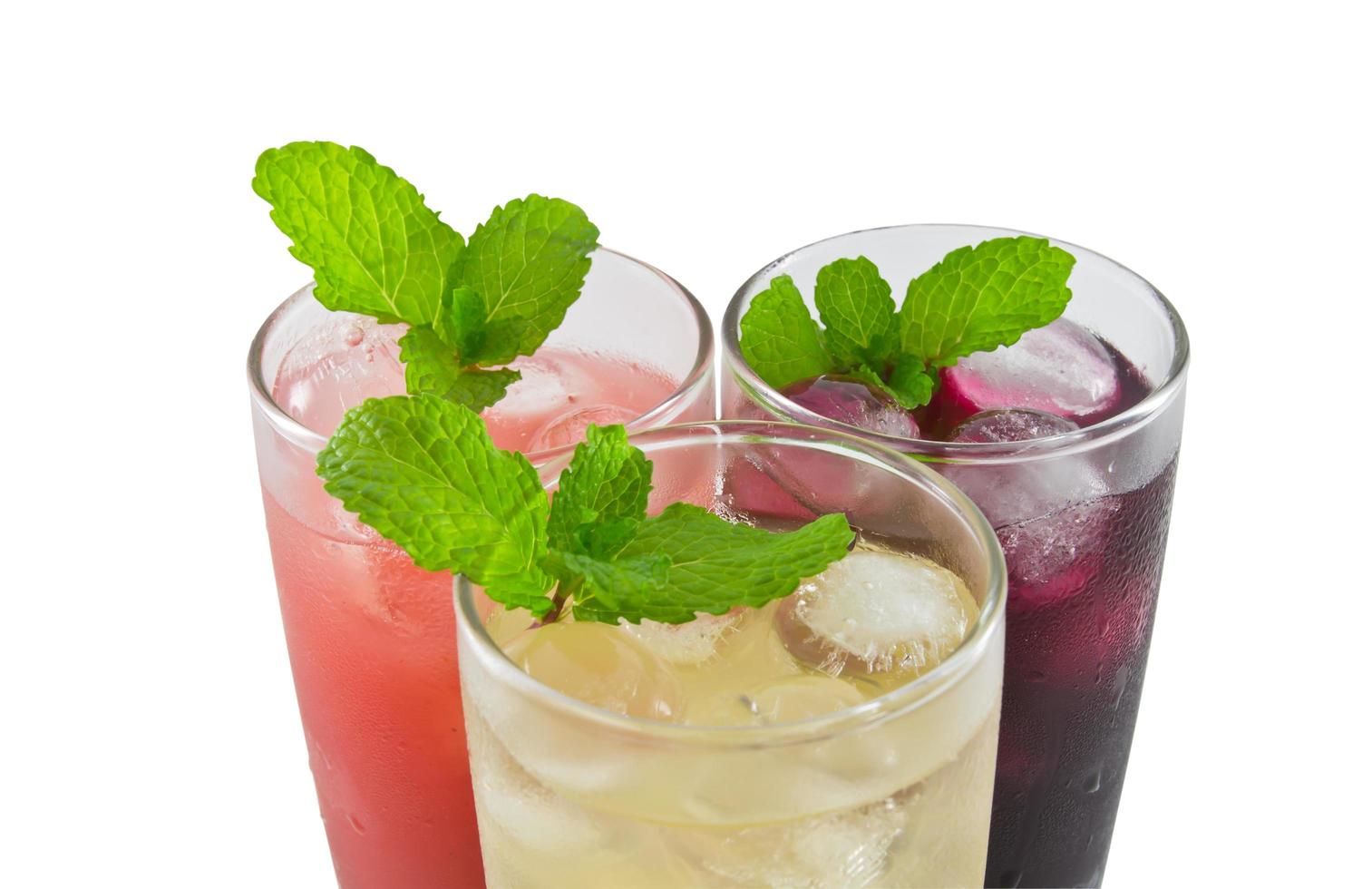 Three glass of apple,grape and strawberry juice photo