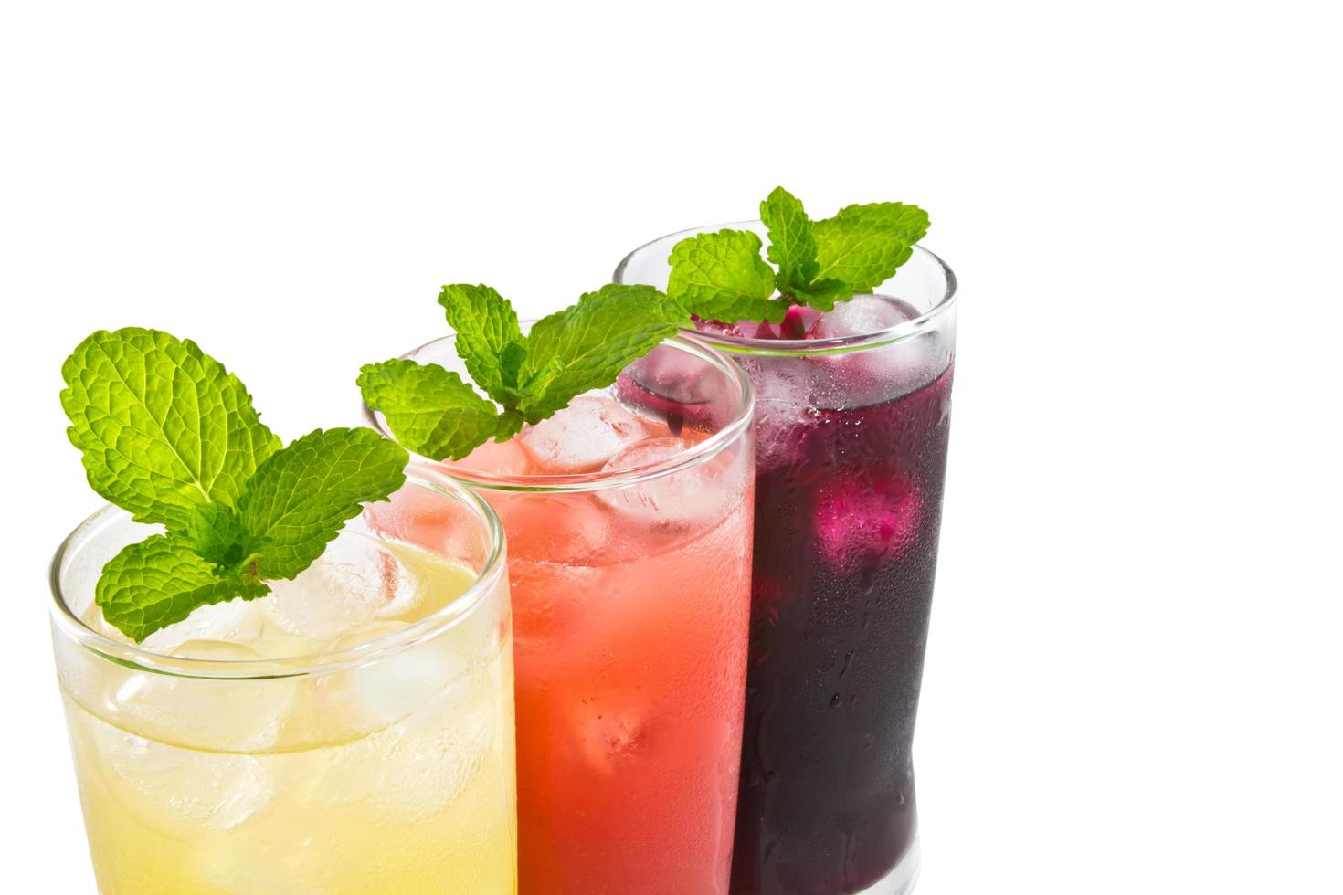 Three glass of apple,grape and strawberry juice photo