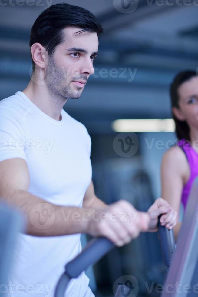 man running on the treadmill photo