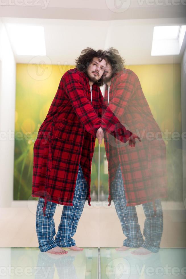 portrait of young man in bathrobe photo