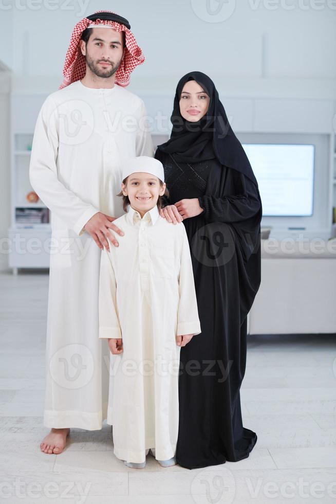 portrait of young happy arabian muslim family photo