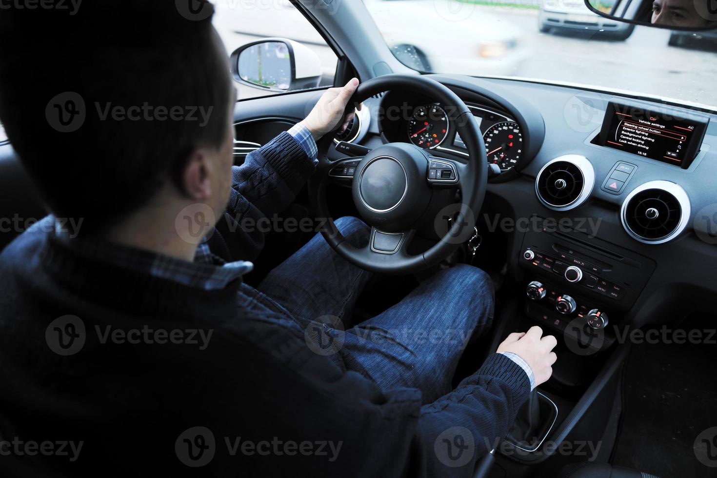 man using car navigation photo