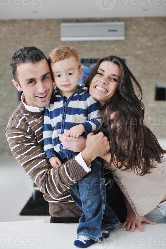 happy young family have fun  at home photo