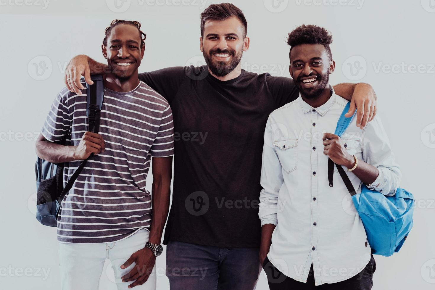 A photo of a group of happy students isolated on white background.