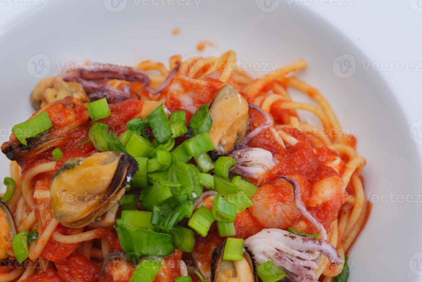 Pasta with shrimps, herbs and mashrooms photo