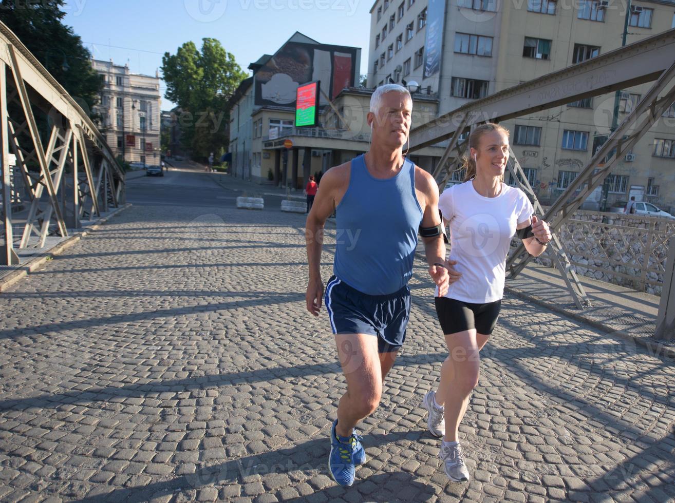 Couple jogging outside photo