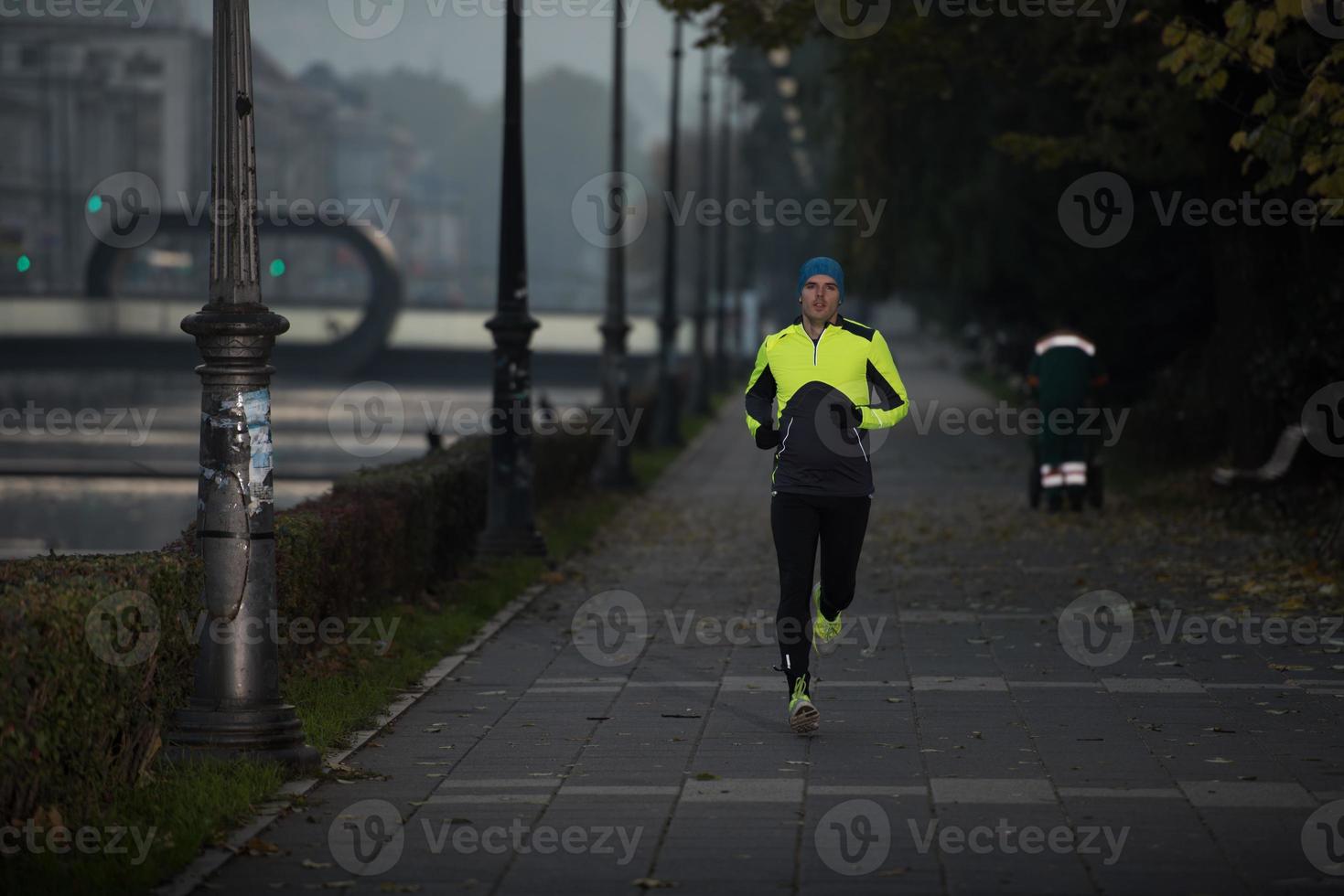 man jogging outside photo