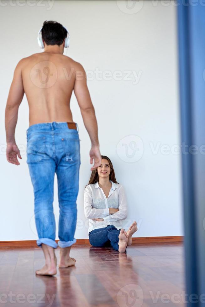 happy young romantic couple have fun arelax  relax at home photo