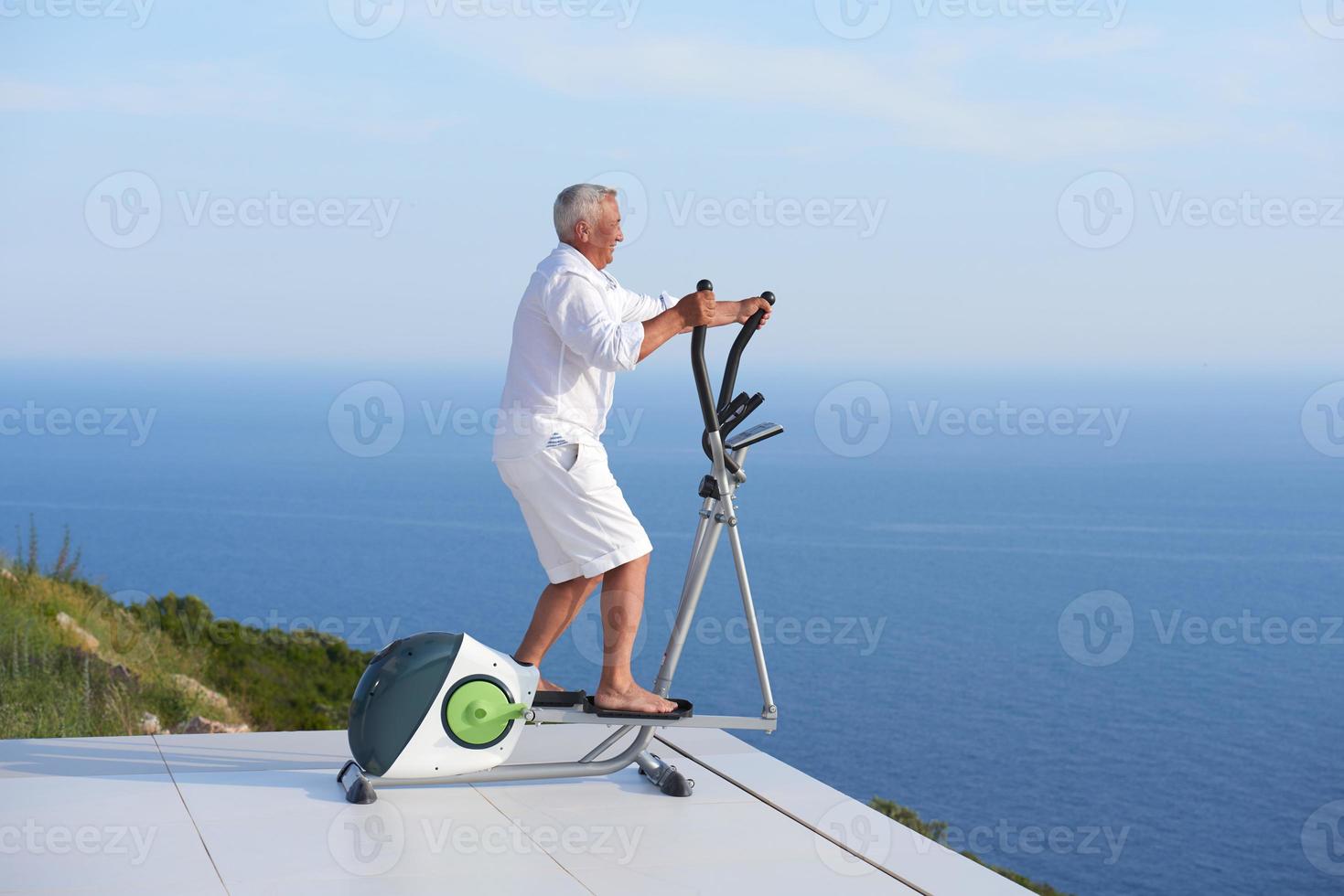 healthy senior man working out photo