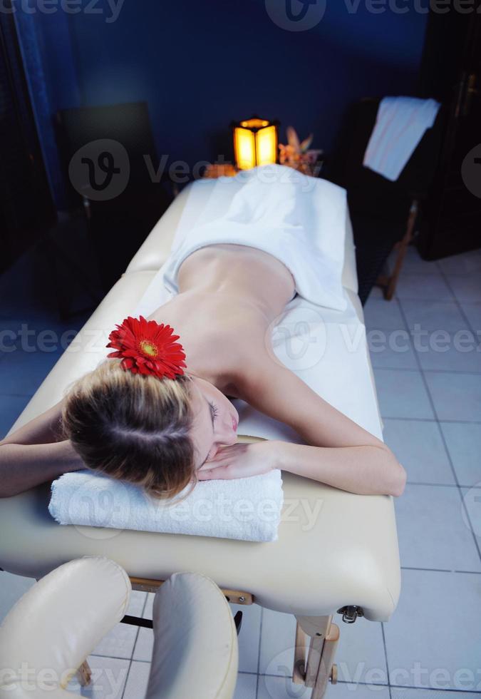 Beautiful young woman in spa photo