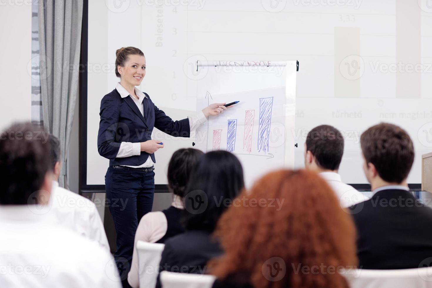 business woman giving presentation photo