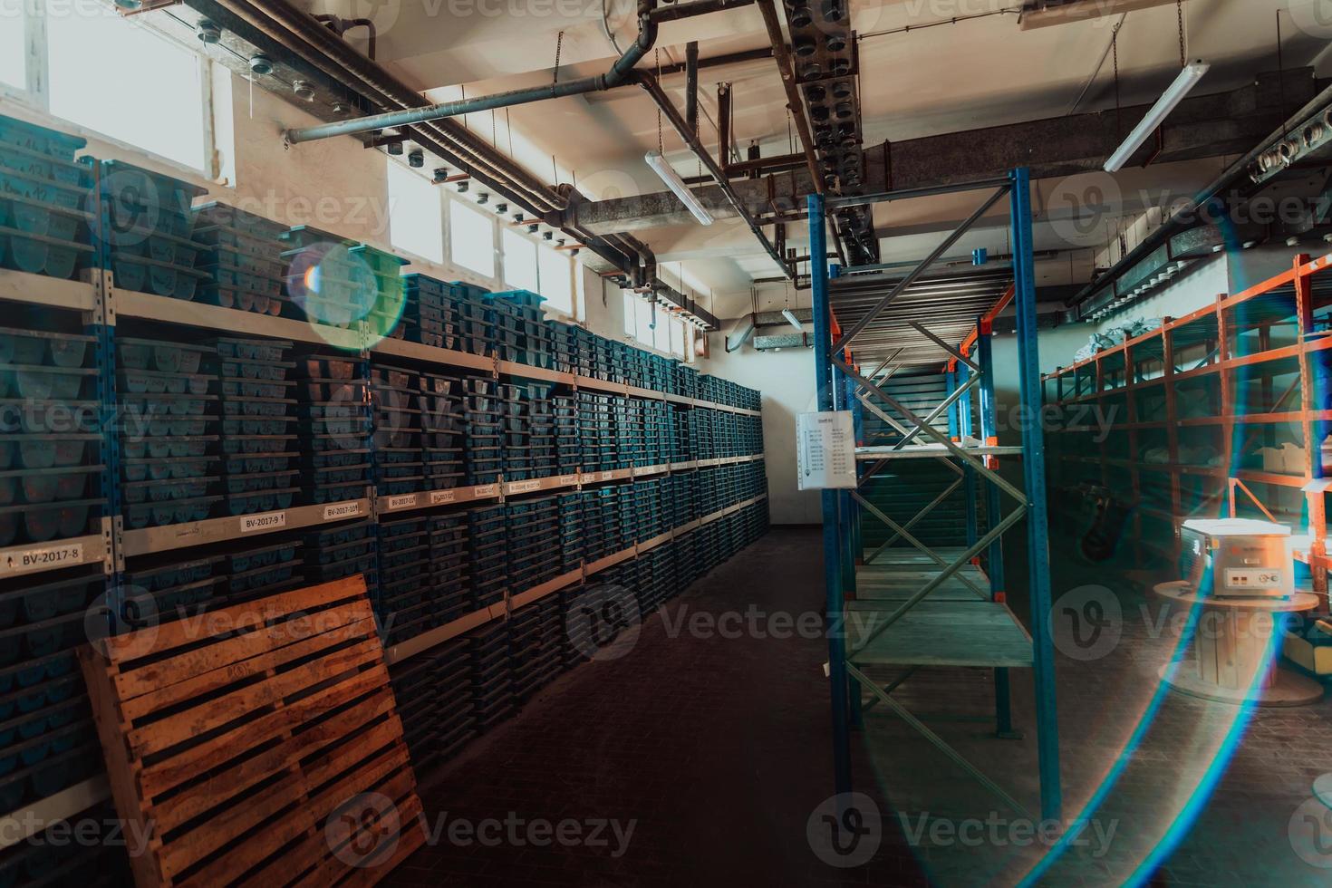 Gold mining storage rock core samples geology drilling industy. Large ore warehouse in modern industry, ores stacked in boxes. Selective focus photo